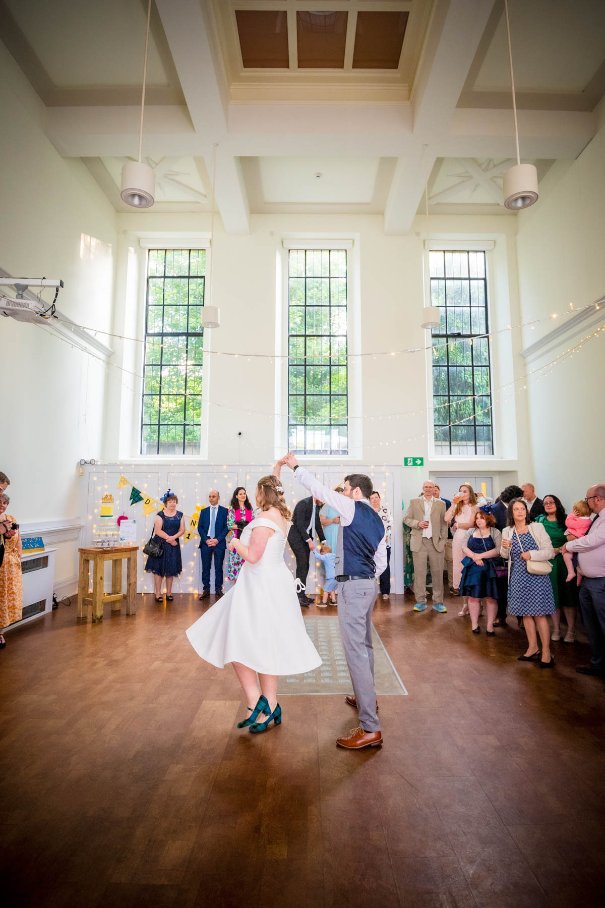 Couple dancing in the Spielman Centre during the first dance at their wedding.