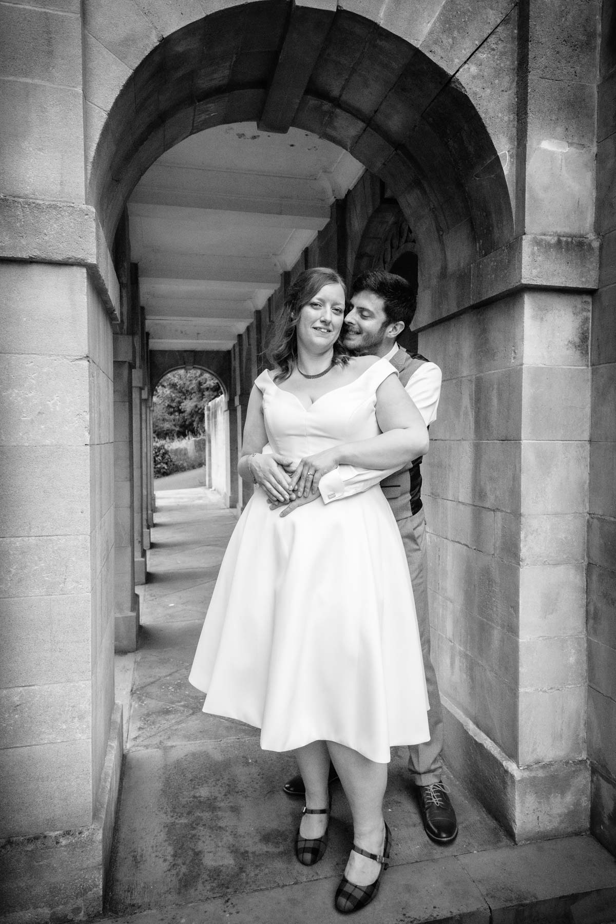 Wedding portrait of couple in the Great War Memorial at Arnos Vale Cemetery.